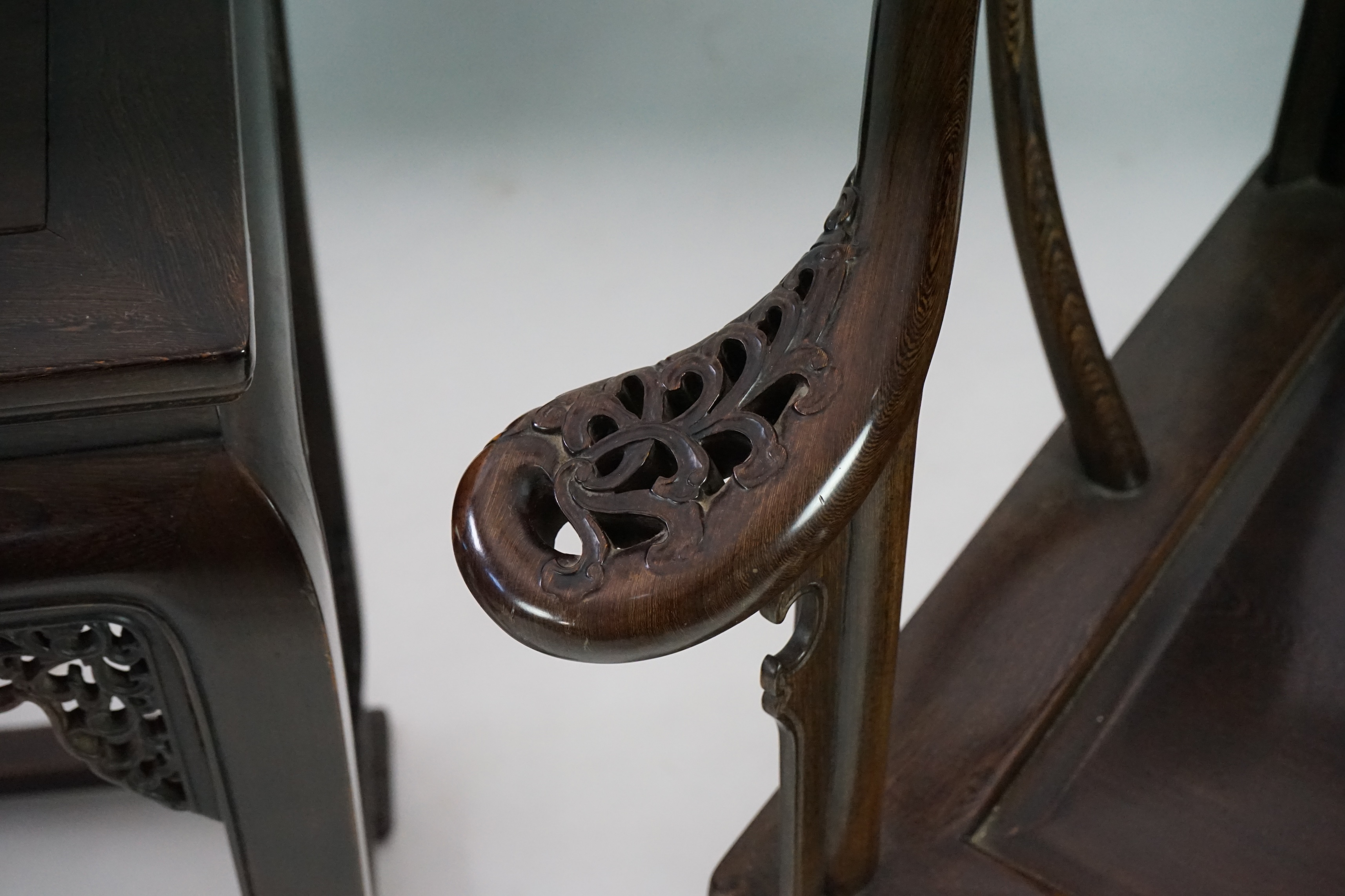 A pair of Chinese jichimu horseshoe shaped armchairs and a matching table, 19th/20th century